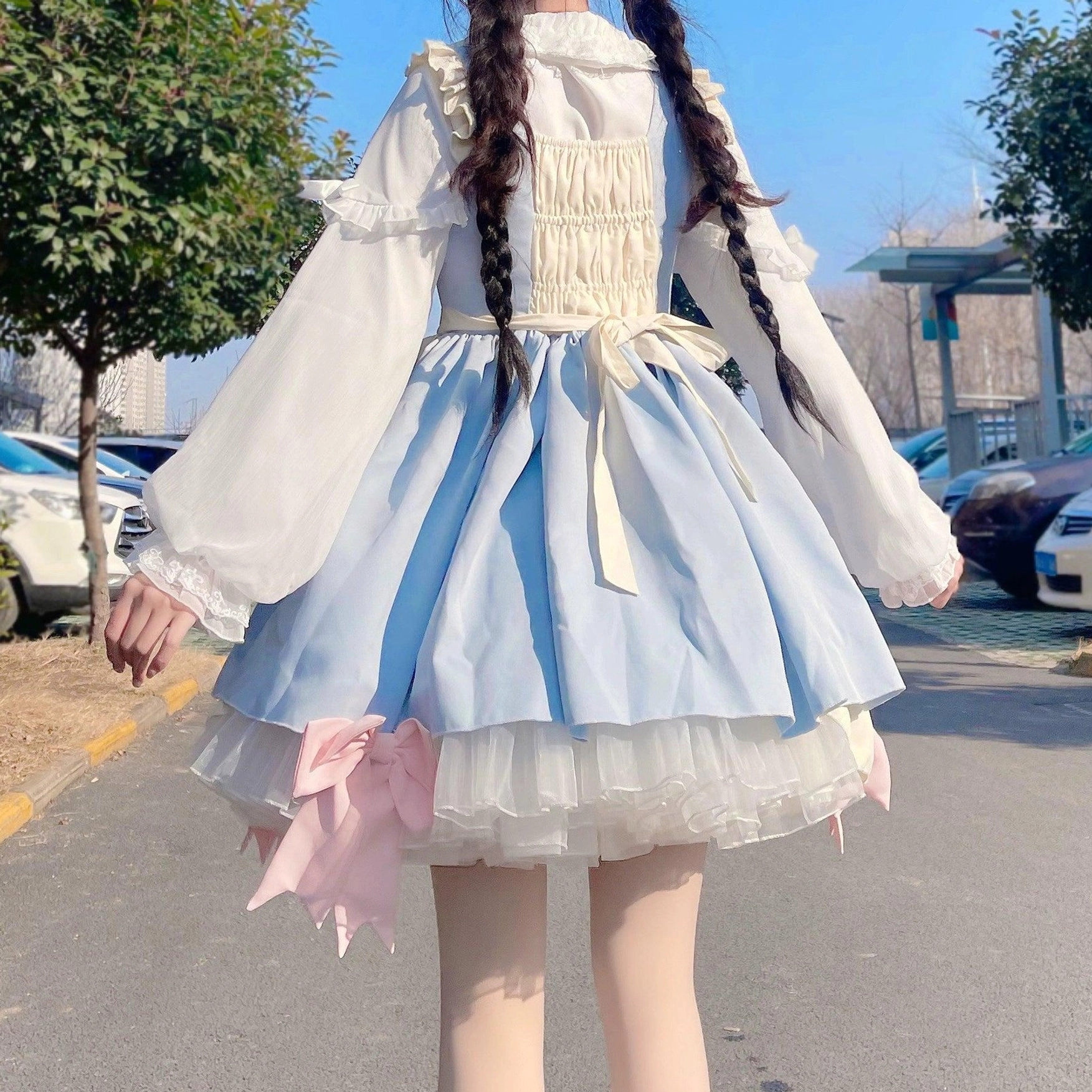 Peter Pan collar detail of sweet Lolita blouse showing ruffled design with lace trim and delicate construction framing the neckline area