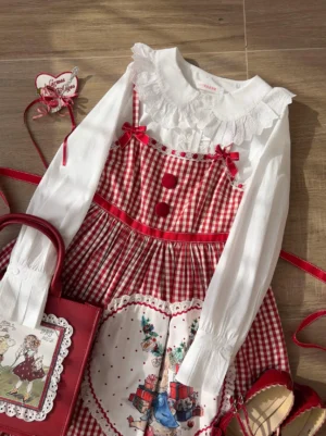 white lolita cotton blouse peter pan collar with ruffled placket styled with red gingham jumperskirt lolita coordinate flat lay with accessories