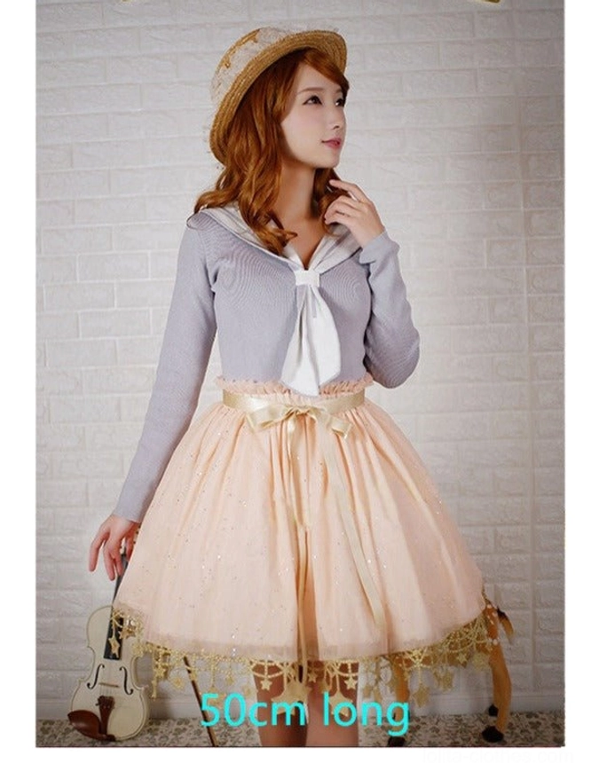 Pink sweet lolita petticoat 50cm length worn with sailor collar top showing front standing pose and volume
