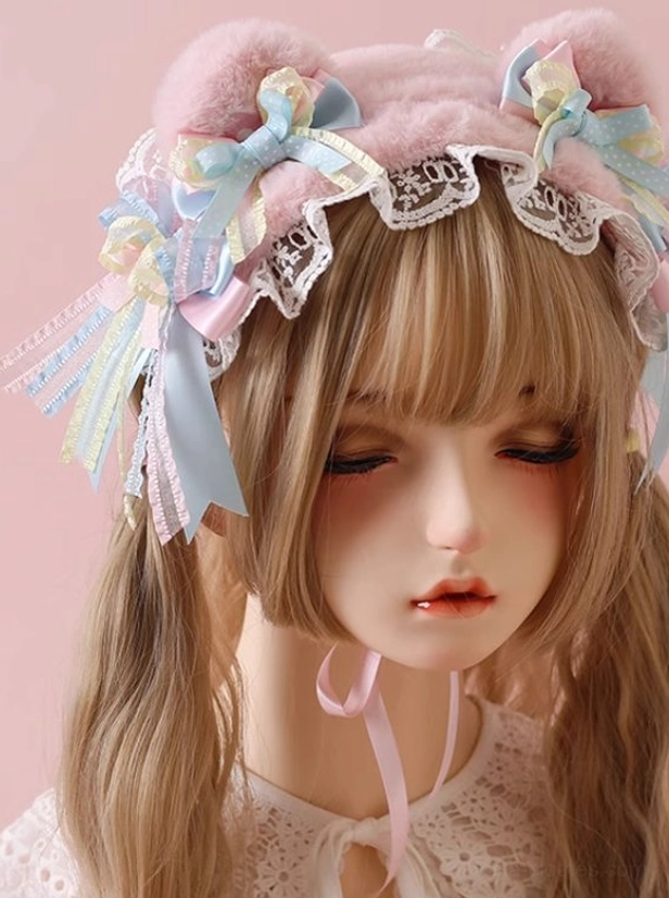 Pink bear ear sweet lolita headband close-up with delicate ruffled lace trim plush ears pastel blue yellow ribbon streamers detail view