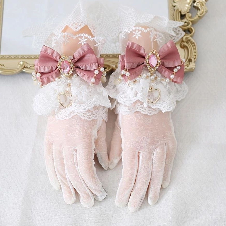 Pink satin bow vintage lolita lace gloves with delicate gem embellishment white ruffled cuffs and heart pendants