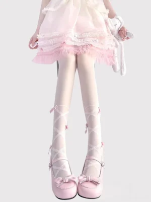Pink bows delicate crisscross lolita summer pantyhose paired with pink frilly skirt and bow mary jane shoes front full view
