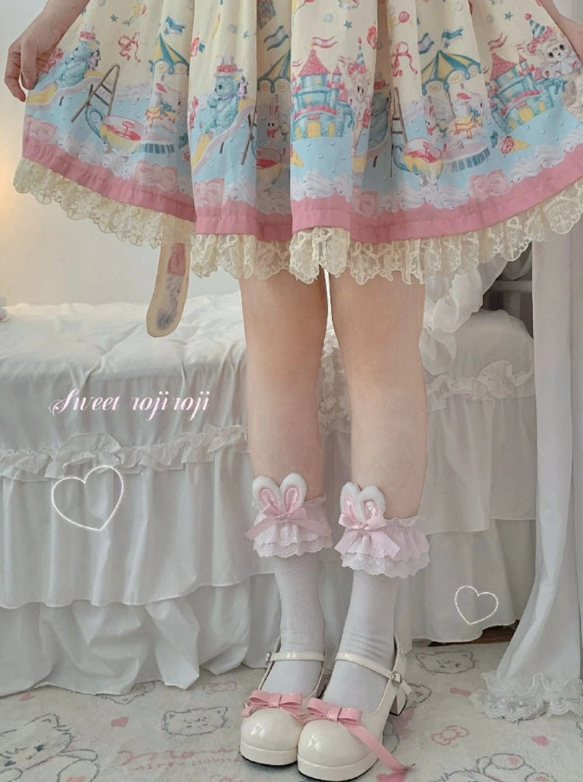 Pink bunny ear bow lolita short socks white base with lace trim worn with carousel print lolita dress side view