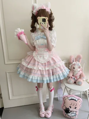 Pink cat ear lolita jumper dress with white ruffled bodice and matching blouse doll collar front full length mirror selfie