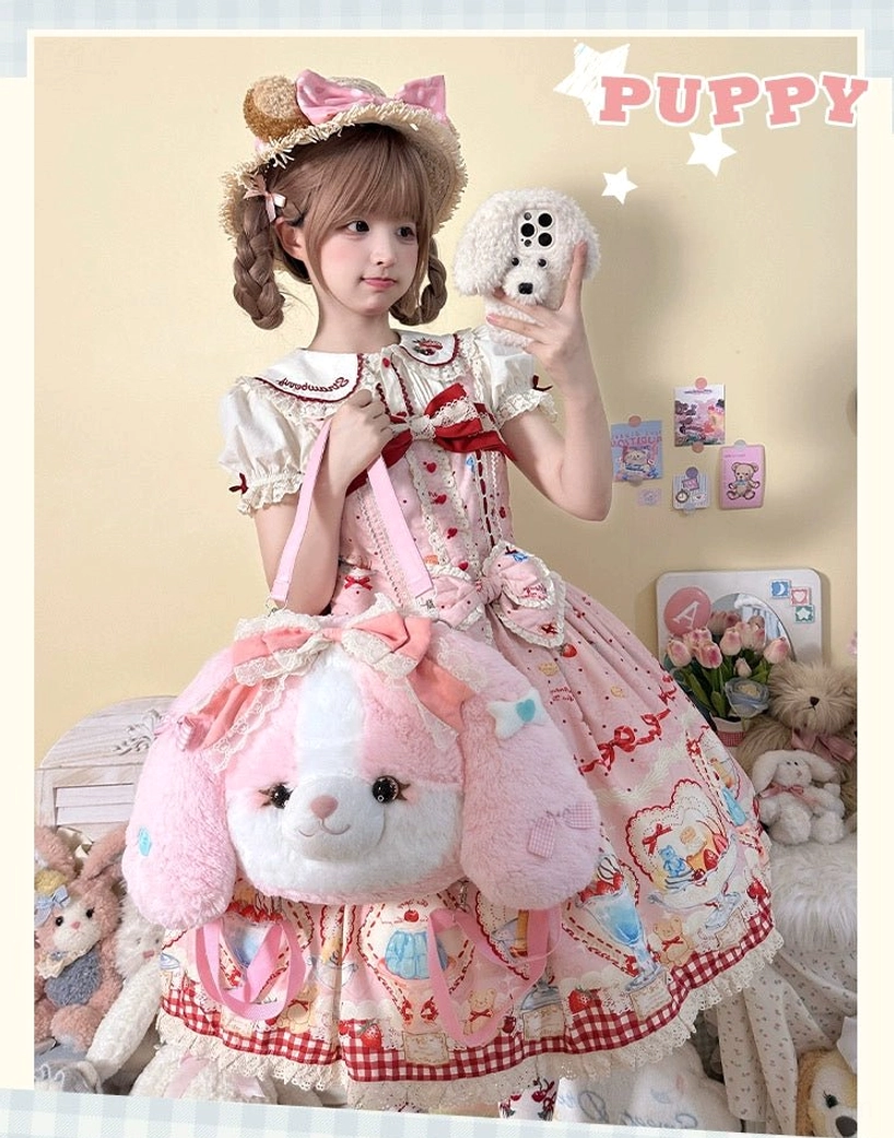 Pink Cocker Spaniel plush lolita backpack front view with model in pink gingham sweet lolita dress and bow hat holding mini puppy toy