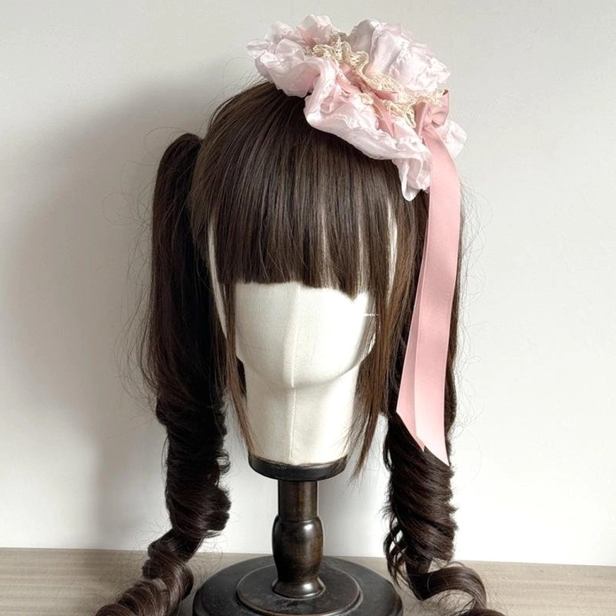 Pink floral lace lolita KC head accessory with matching pink flower cluster and satin ribbon cascade on brown wig mannequin