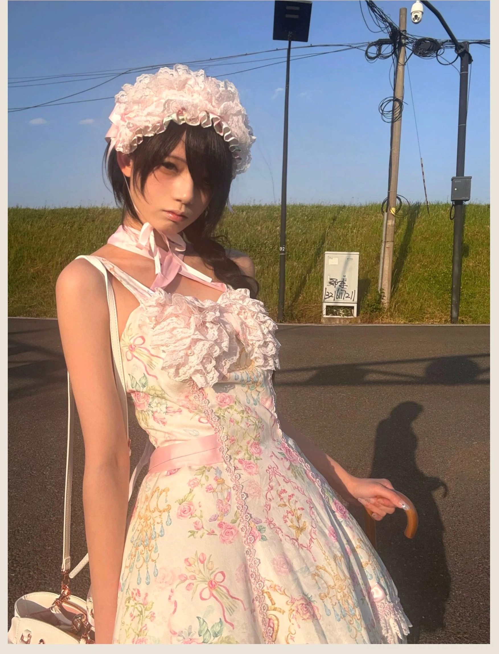 Pink floral Lolita JSK jumper skirt dress with all recommended accessories including bonnet and coordinated elements