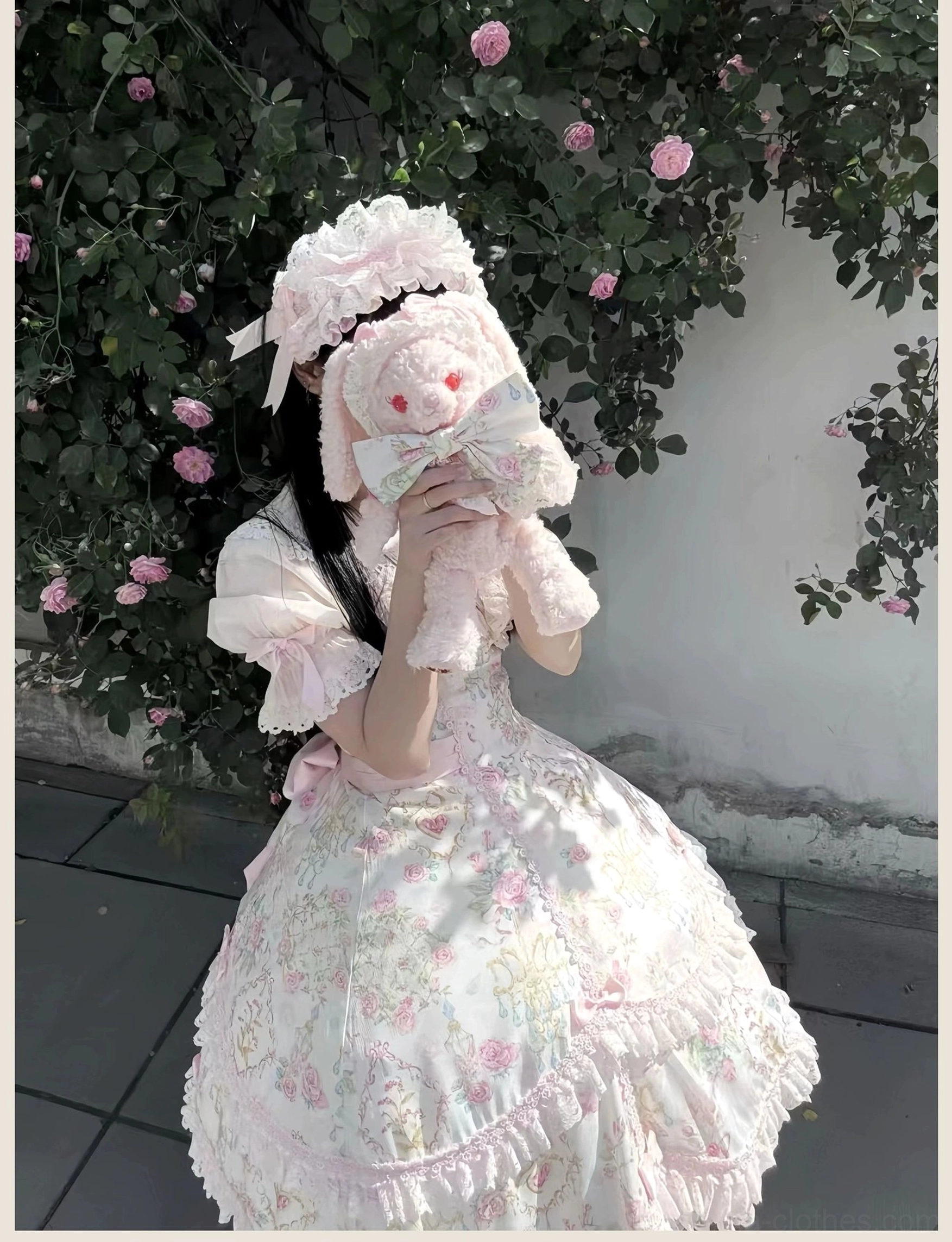Pink floral Lolita JSK dress styled for anime convention and Japanese cultural festival wearing context display