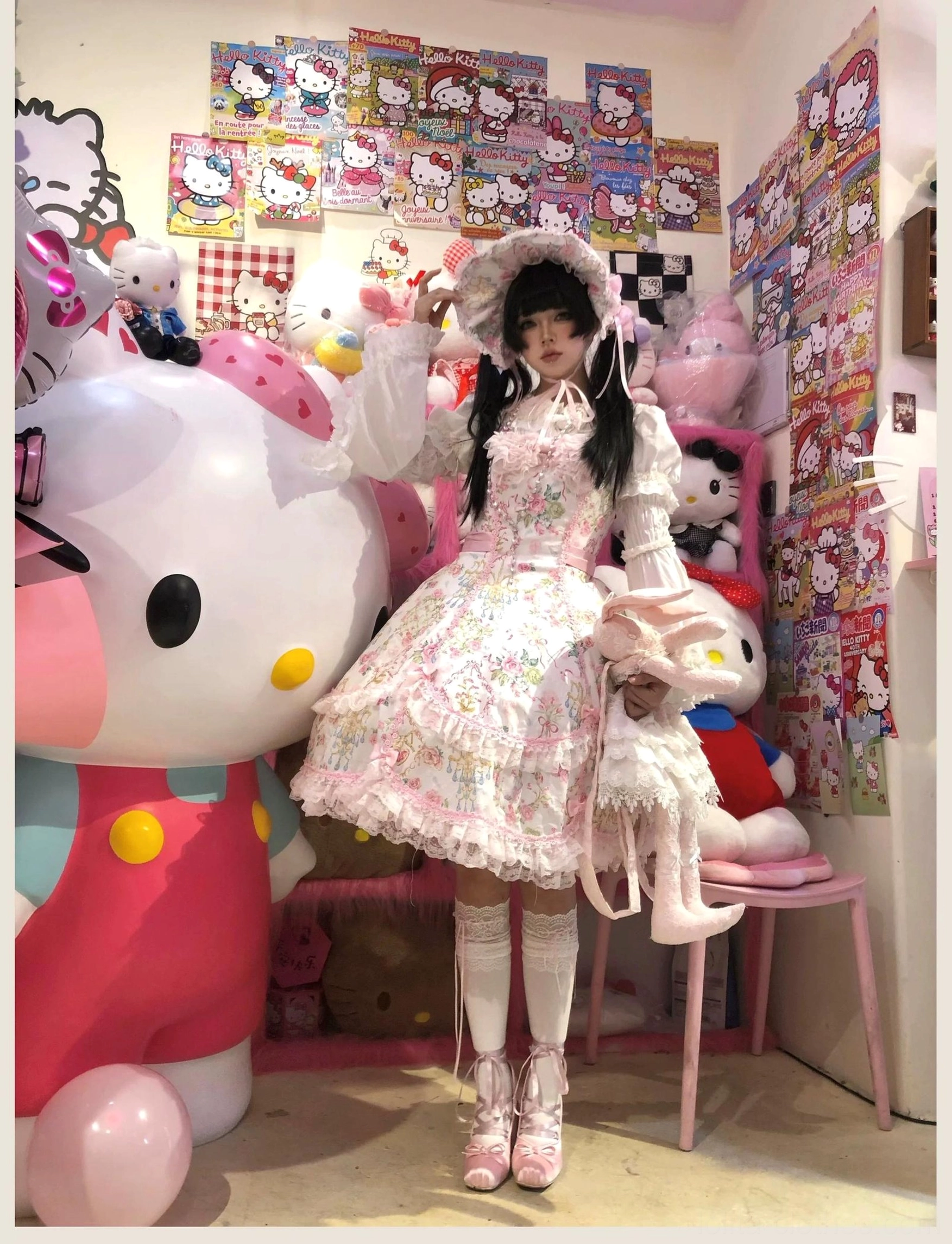 Pink floral Lolita JSK dress showing care and maintenance featuring hanging storage and preservation techniques