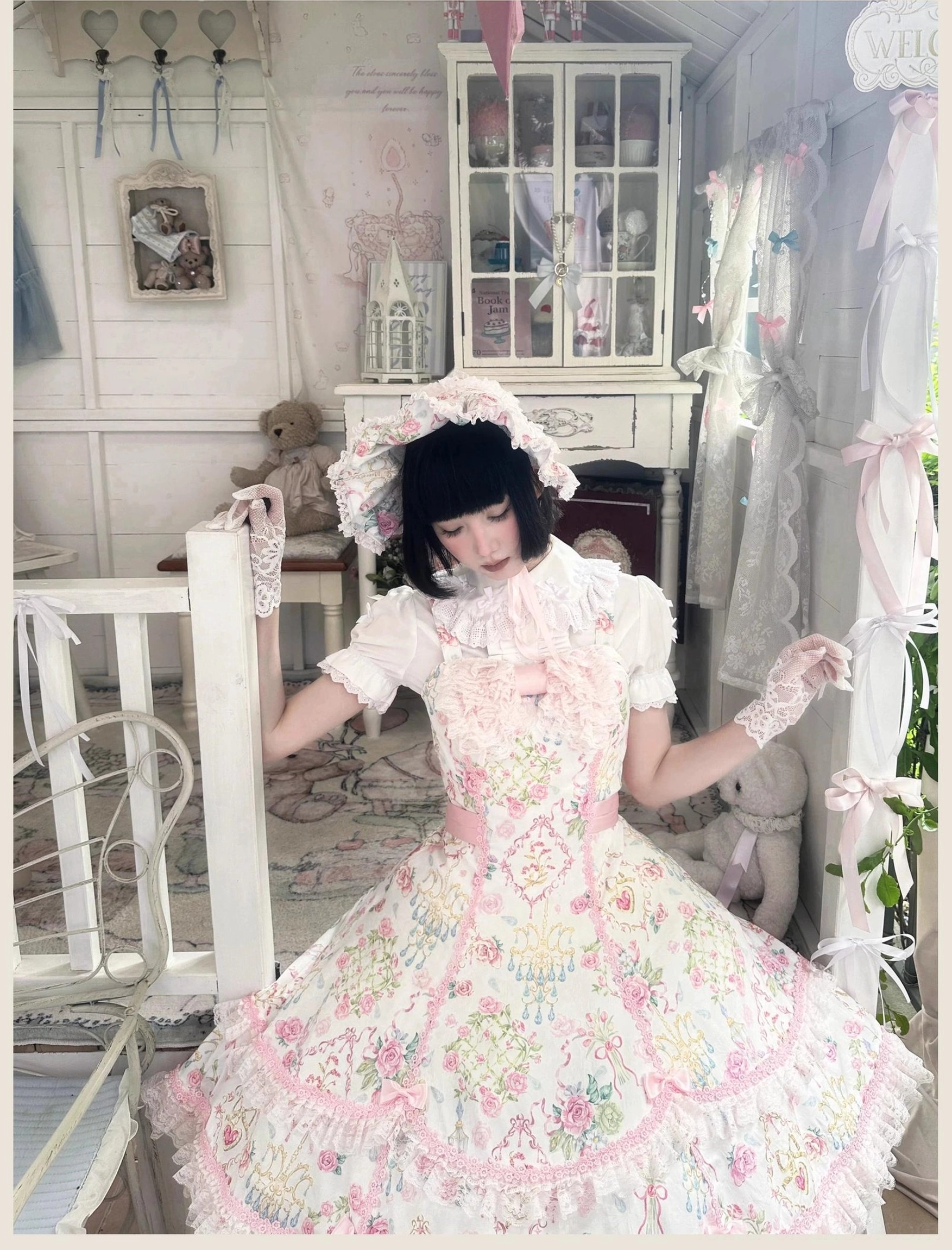 Pink floral Lolita JSK dress packed for travel in dry bag with care instructions for handling during transport