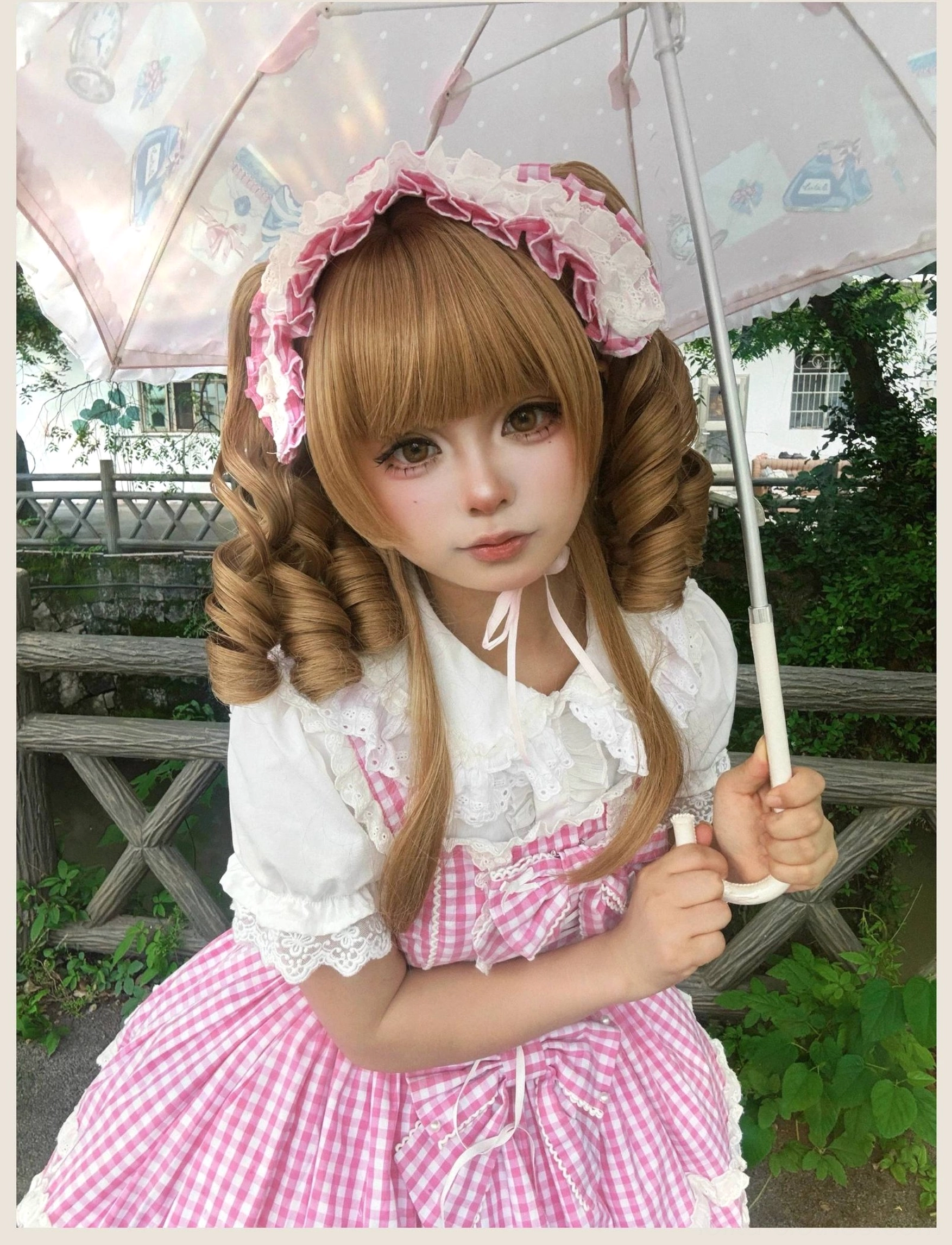 Old school Lolita jumper skirt dress in pink gingham, fabric texture and print detail close-up showing quality of cotton material and precision of gingham pattern print