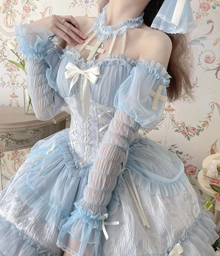 Pink Gothic Lolita arm cuffs with delicate sheer ruffles and satin ribbon bow details for romantic dark Lolita fashion styling and coordination