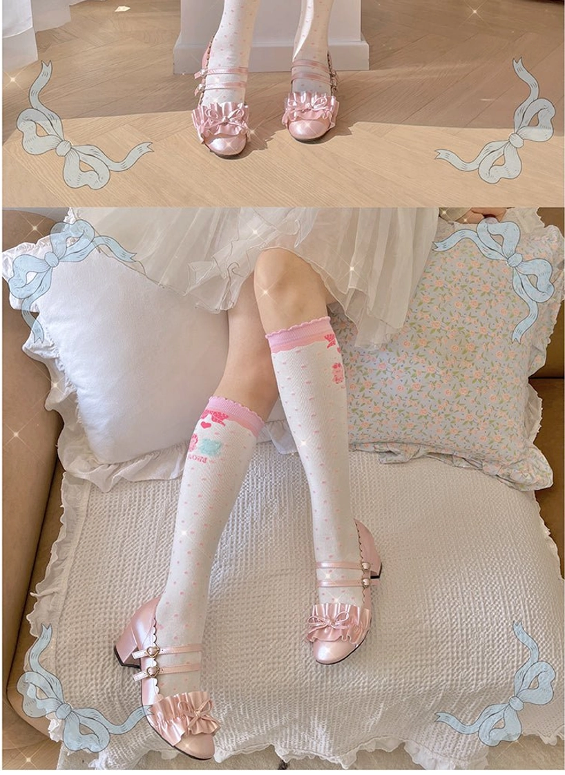 Pink trim lolita calf socks with ruffled cuff heart polka dots bear bunny cartoons worn on cozy bedroom bed with floral pillows