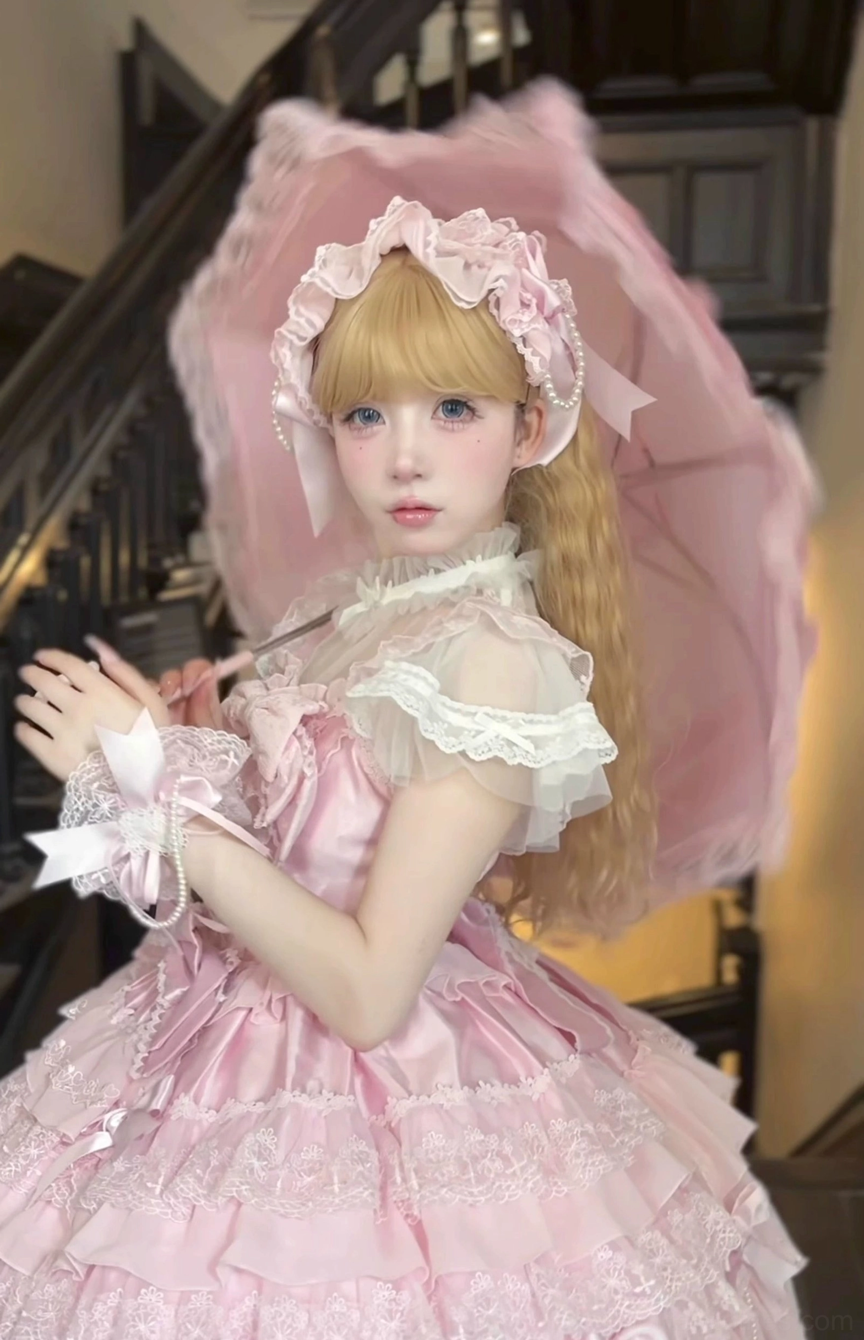 Pink lolita cuffs pair sleeve accessories detail shot showing lace design and handmade artisanal quality craftsmanship