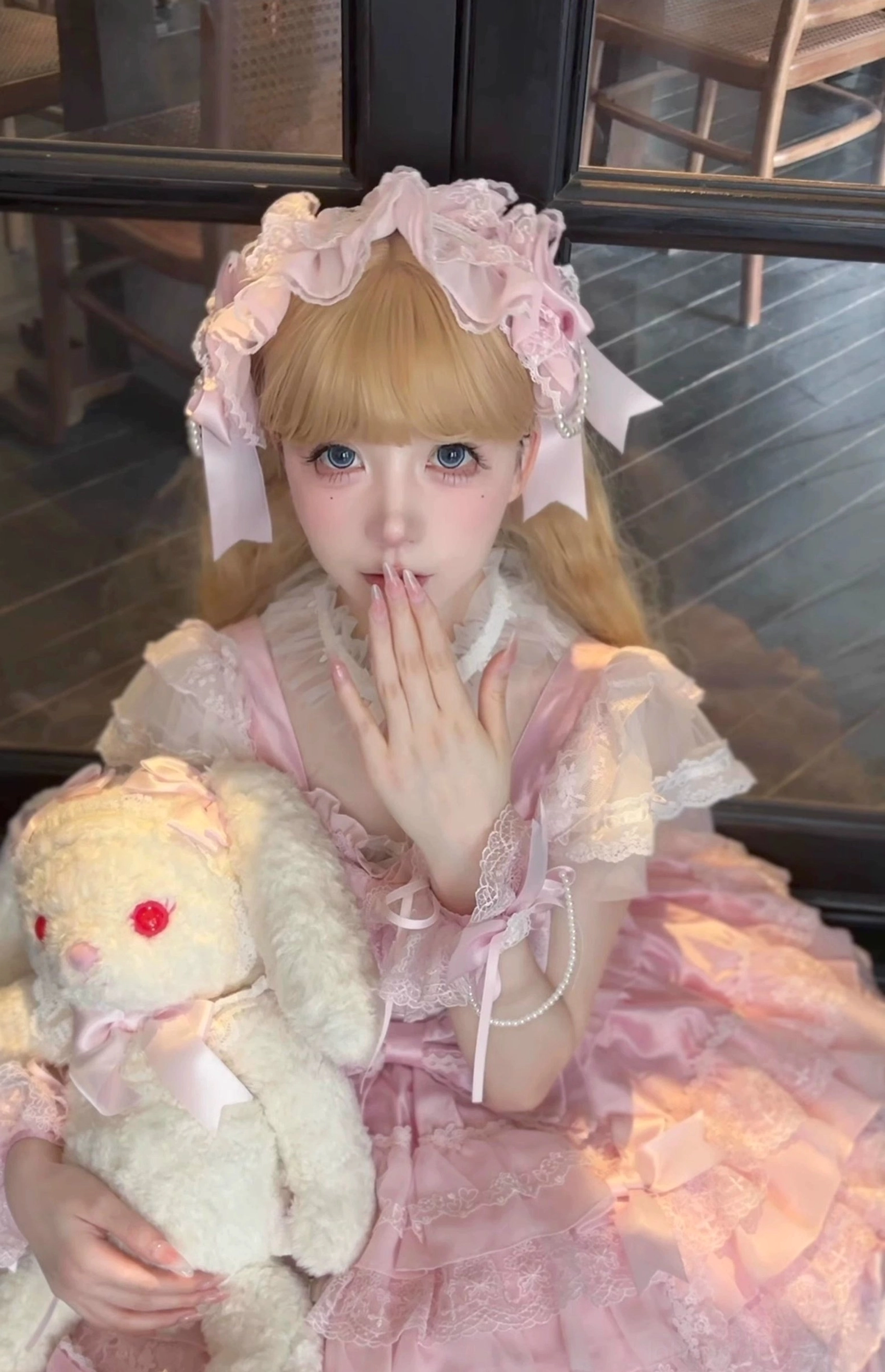 Pink lolita hairband accessory with bow details and coordinating elements for complete sweet lolita fashion look