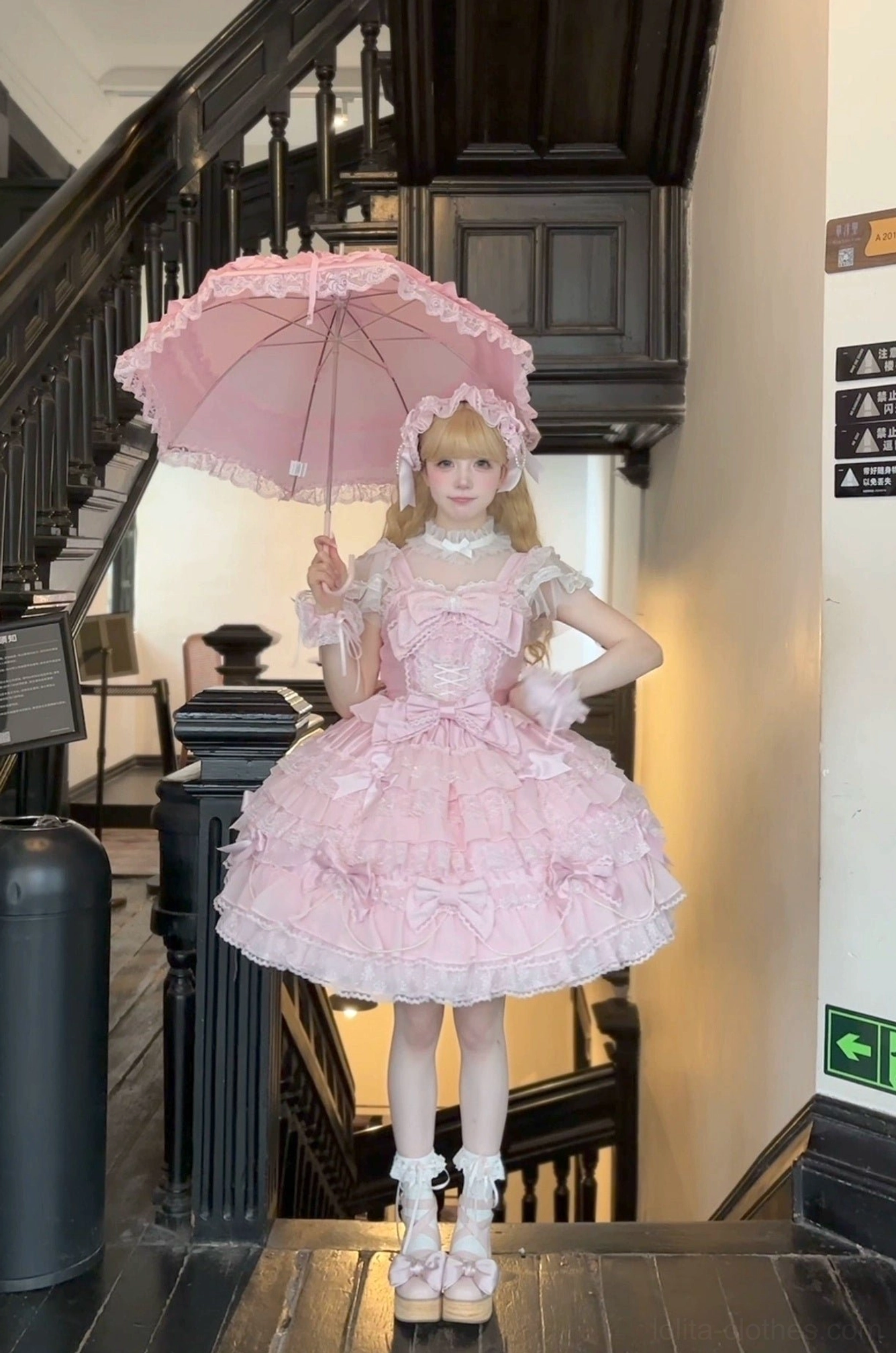 Pink lolita hairband headwear accessory with bow details close-up showcasing coordinating pieces for complete lolita outfit