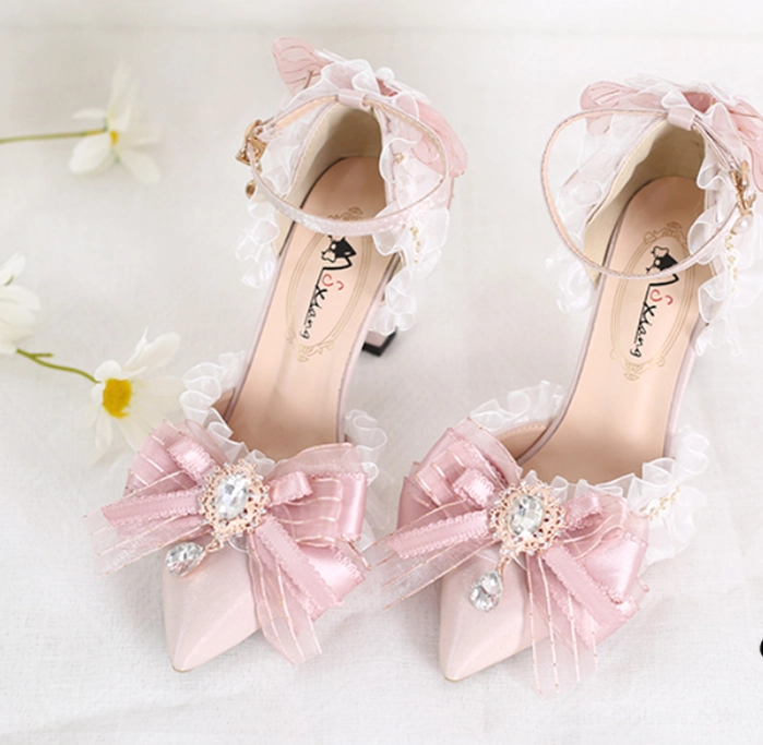 Comprehensive product showcase of pink lolita pointed-toe heels with crystal butterfly charms, showcasing multiple heel design elements, embroidery details, and versatile styling options for lolita fashion