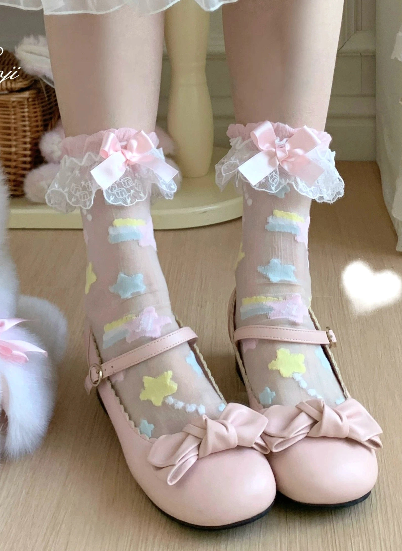 Pink lolita socks with star embroidery and light pink satin bow worn with pink mary jane shoes