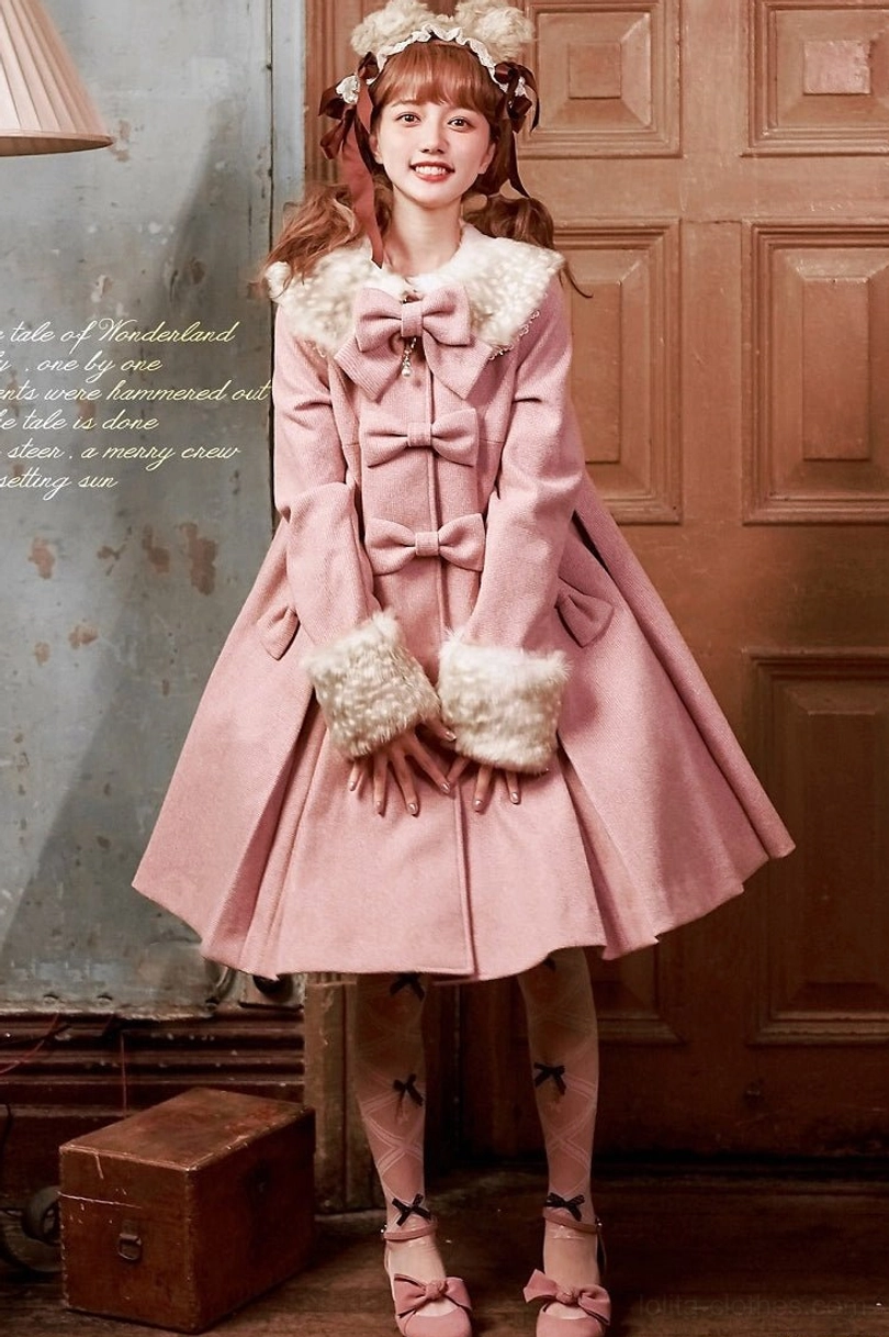 Pink lolita wool overcoat full front view vintage indoor room hair bow accessory white stockings faux fur collar