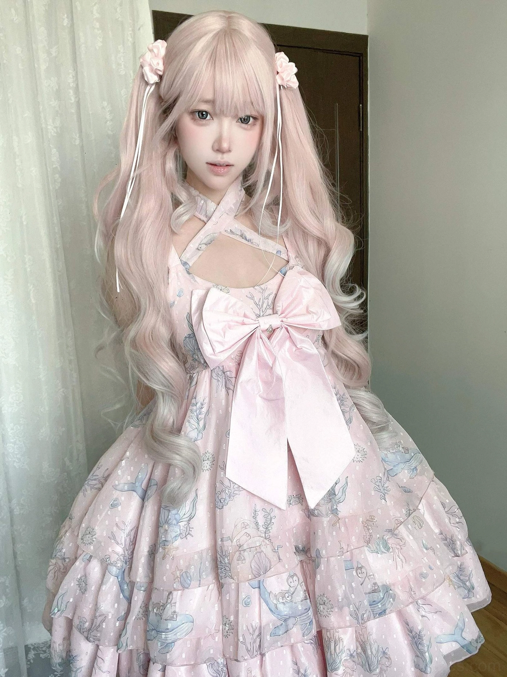 Pink ocean sweetheart sweet lolita jumper skirt full body shot bedroom indoor setting ruffled tiered skirt