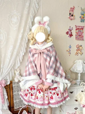 Pink plaid lolita hooded cape with white faux fur trim and large pink bow front full body shot model wearing bear ear hair accessories