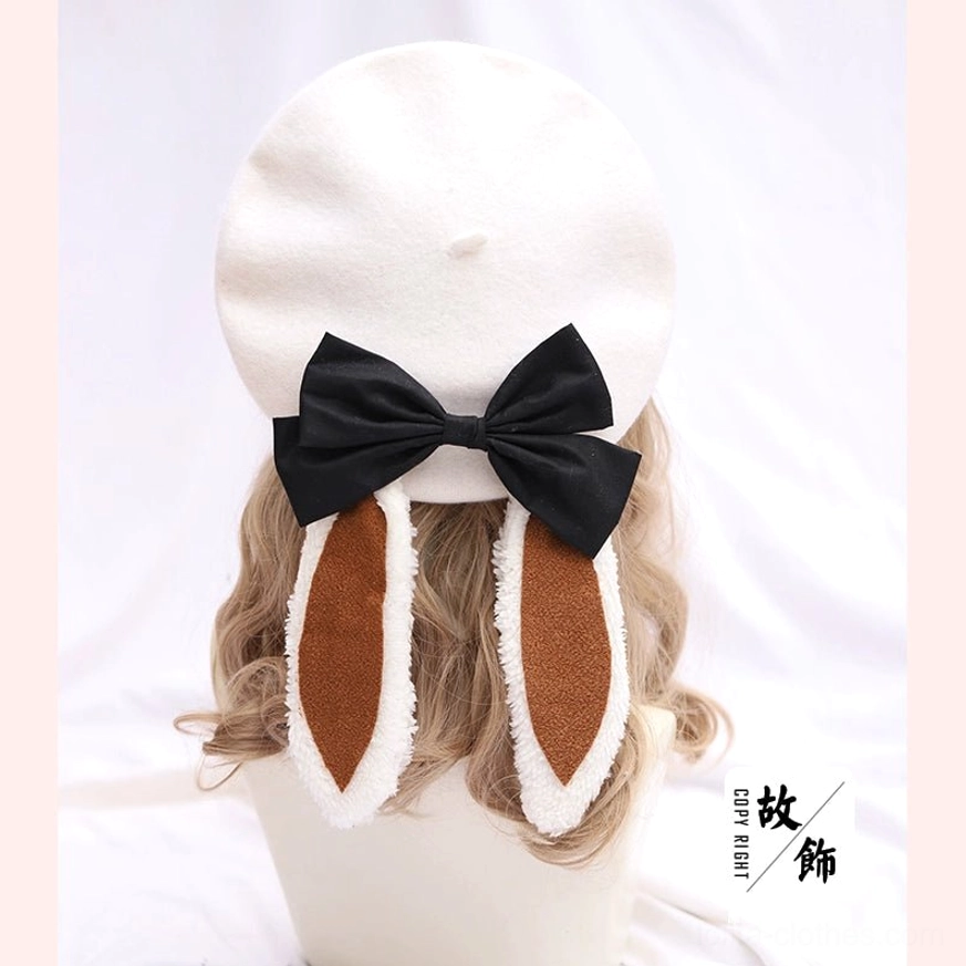 Pink wool lolita beret with white fuzzy trimmed bunny ears and black bow decoration - romantic lolita styling
