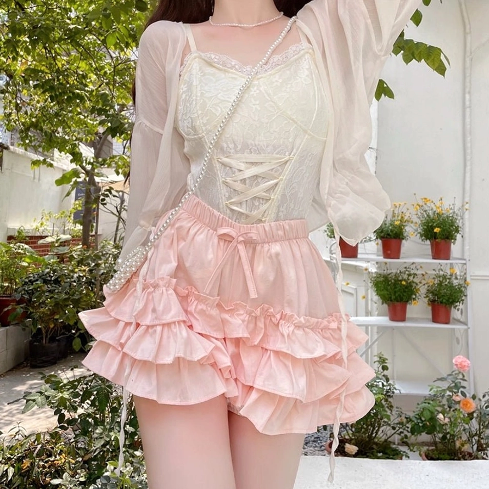 Pink ruffle safety bloomers front side view hip thigh beaded crossbody bag potted plant balcony tiered ruffles lolita fashion detail