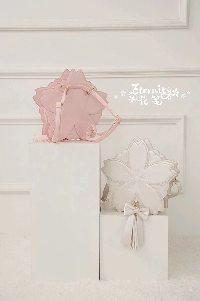 Pink sakura lolita handbag crossbody styling three carrying options crossbody hand-held shoulder versatility demonstration