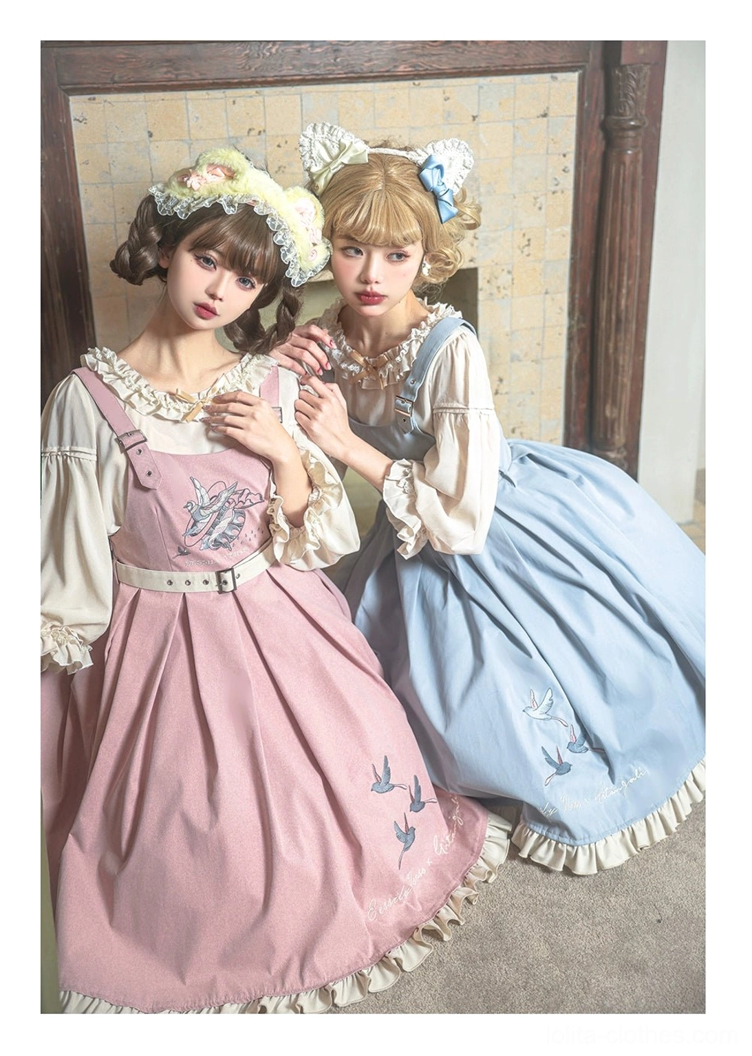 Pink and sky-blue bird embroidery Lolita JSK dresses with inner blouses dual model crouching half-body view indoor retro wooden background delicate embroidery