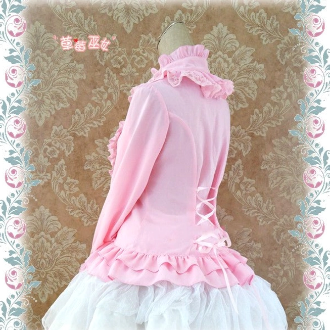 Pink silk Lolita stand collar blouse back view displaying lace-up waist closure ruffled hem and Victorian silhouette