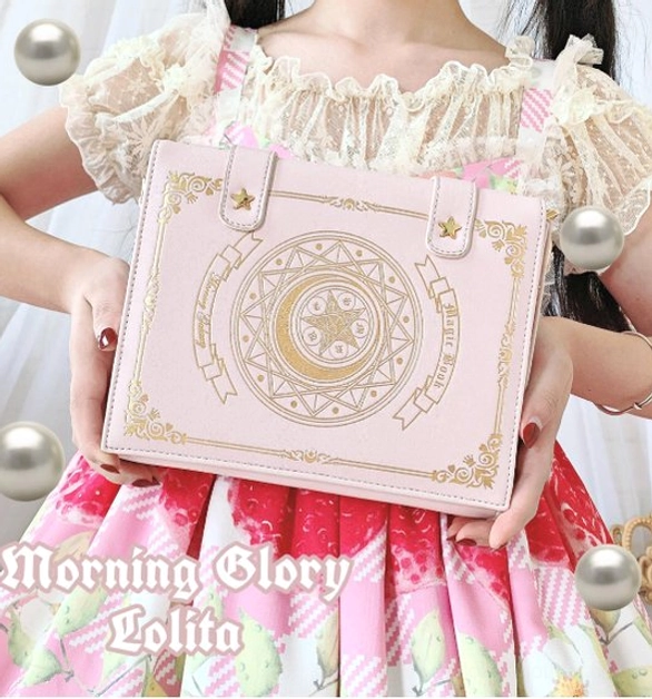 Pink magic book themed lolita crossbody bag close-up front view with exquisite gold magic circle embroidery soft leather material star buckles