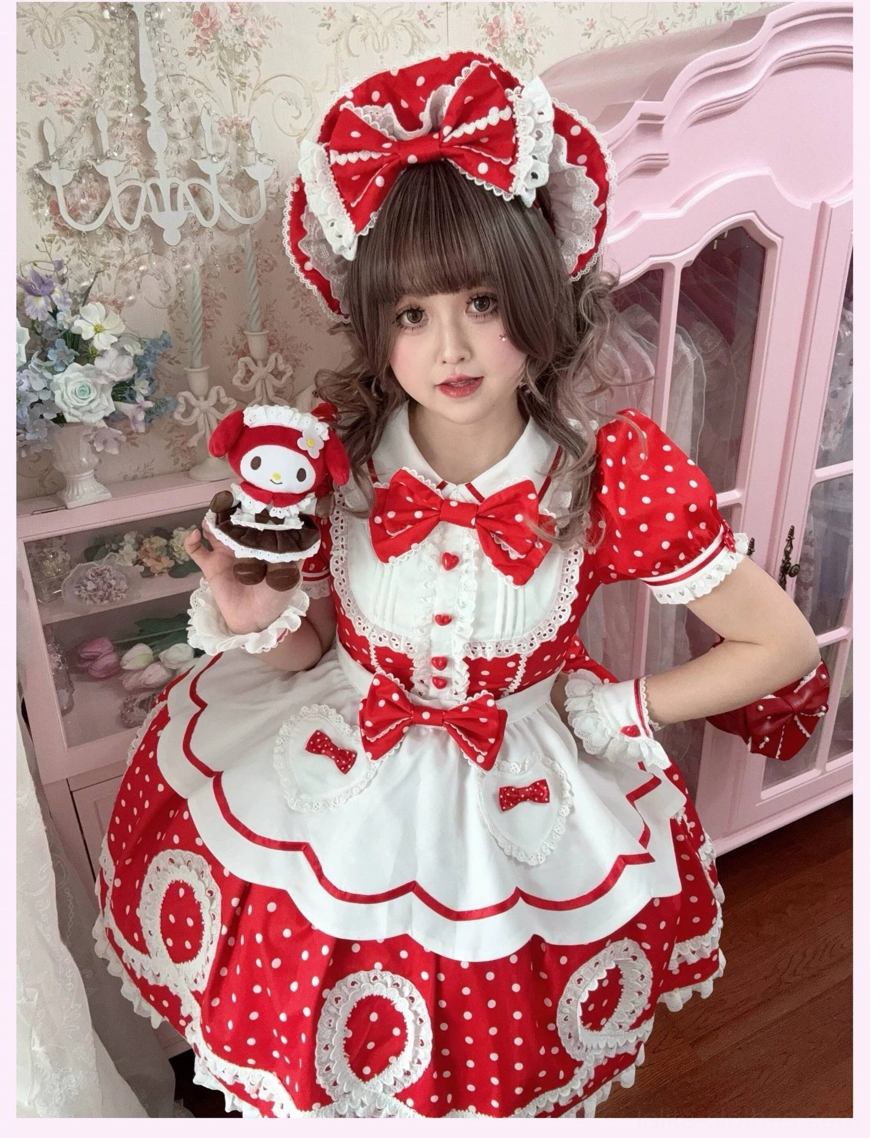 Pink striped lolita OP dress hem detail showing scalloped edge and white lace trim construction