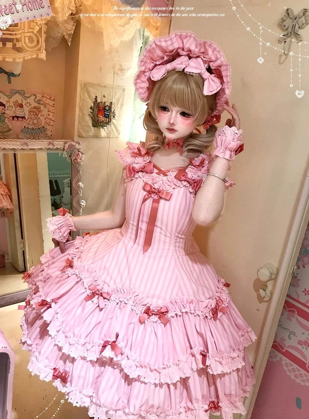 Pink striped old school Lolita JSK dress detail view showing six-panel construction, vertical stripes, and layered ruffled skirt structure
