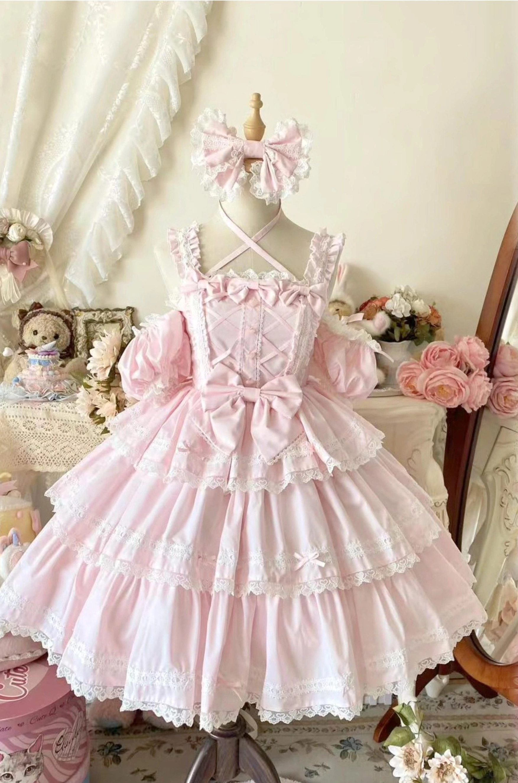 Pink Sweet Lolita JSK jumper skirt dress form front display crisscross back straps removable off-shoulder sleeves lace-trimmed tiered ruffled skirt vintage bedroom studio