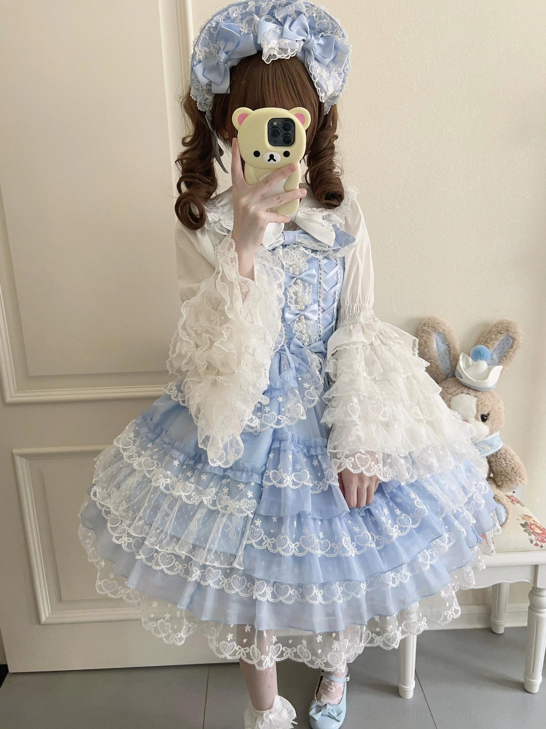 Pink Sweet Lolita JSK dress detail of ruffle layering and lace appliqué showing artisan craftsmanship and construction quality