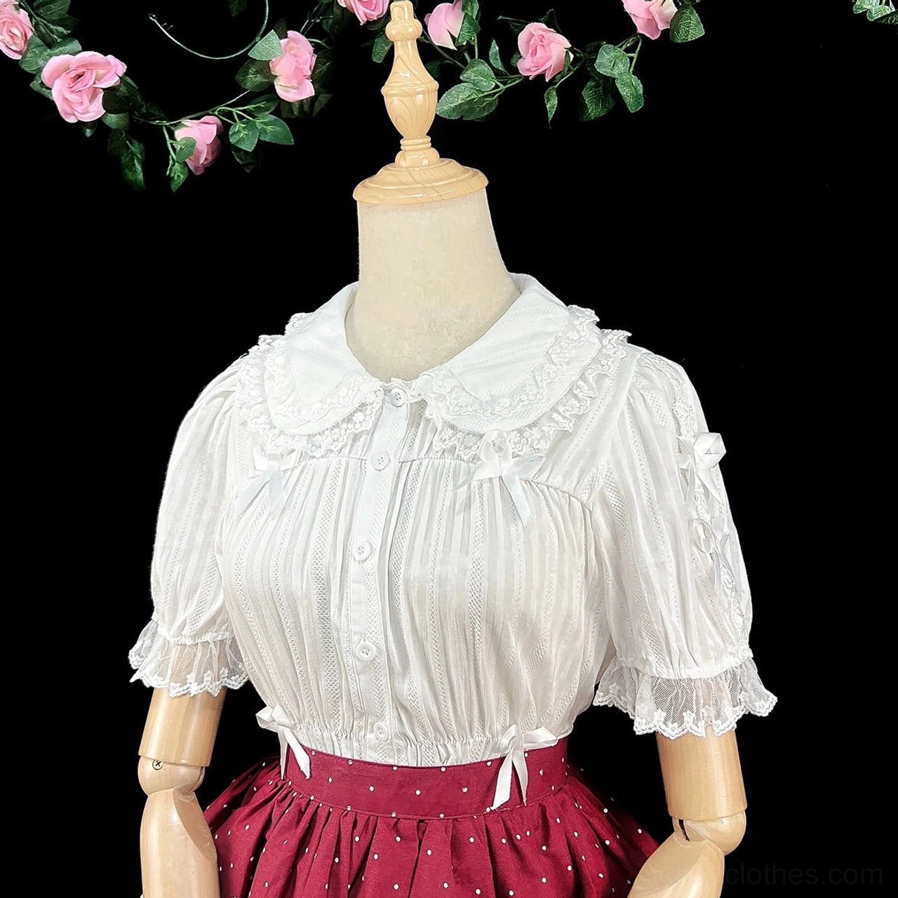 Pink sweet lolita blouse long sleeve puff sleeves detachable bow accents casual wear coordination