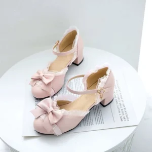 Pink Sweet Lolita Mary Jane chunky heel shoes with satin bow ruffled lace ankle opening and gold buckle strap three quarter view