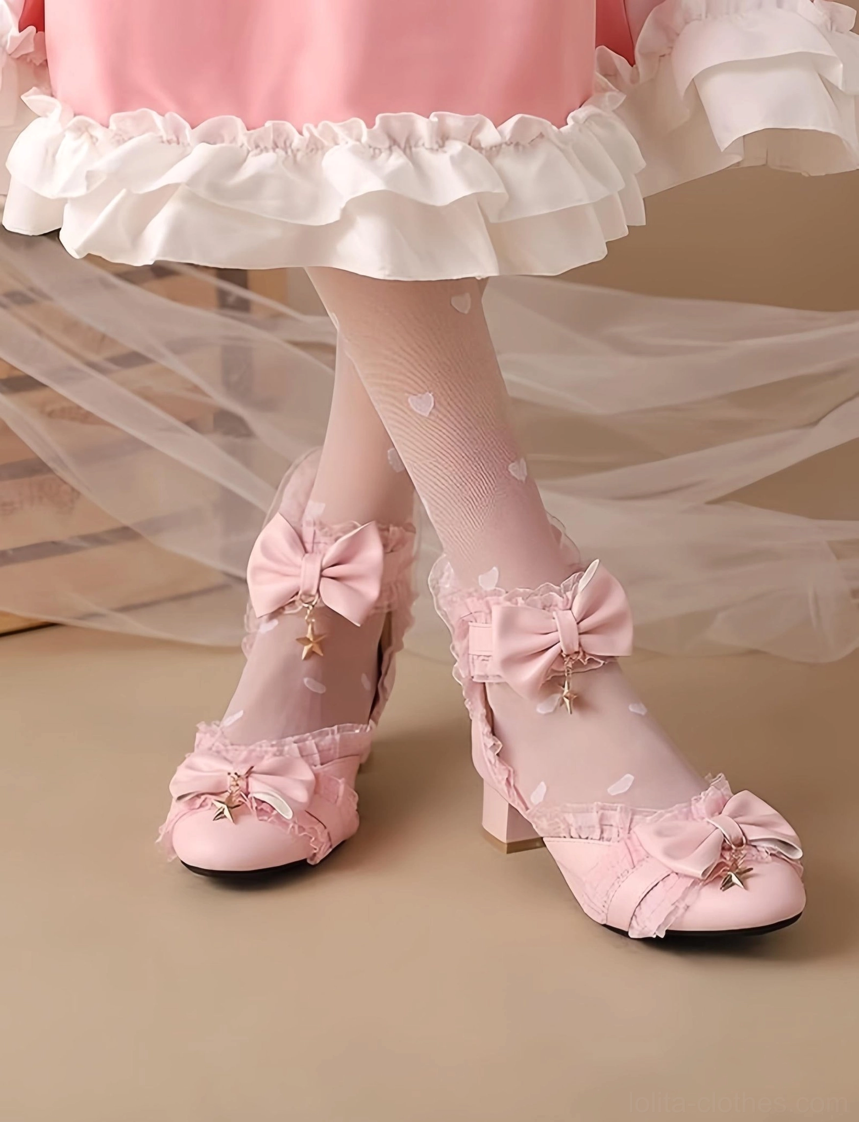Pink Sweet Lolita Mary Jane shoes with star charm bow and ruffled ankle strap worn on model feet, paired with pink ruffled skirt and heart print tights