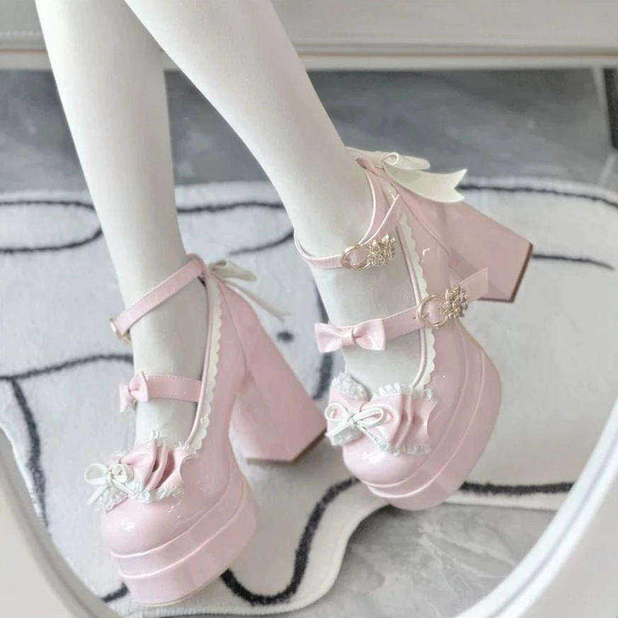 Pink sweet Lolita patent leather heels on-foot side view white stockings with dual bow details and gold heart buckle decoration