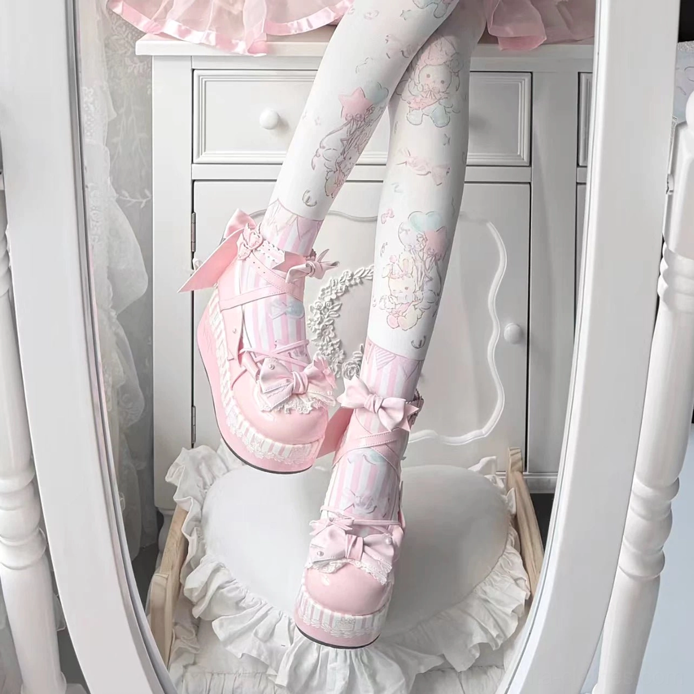 Pink sweet lolita platform shoes showcasing removable back bow, ankle strap bows, pastel pink color scheme, striped platform midsole from multiple close-up wearing angles