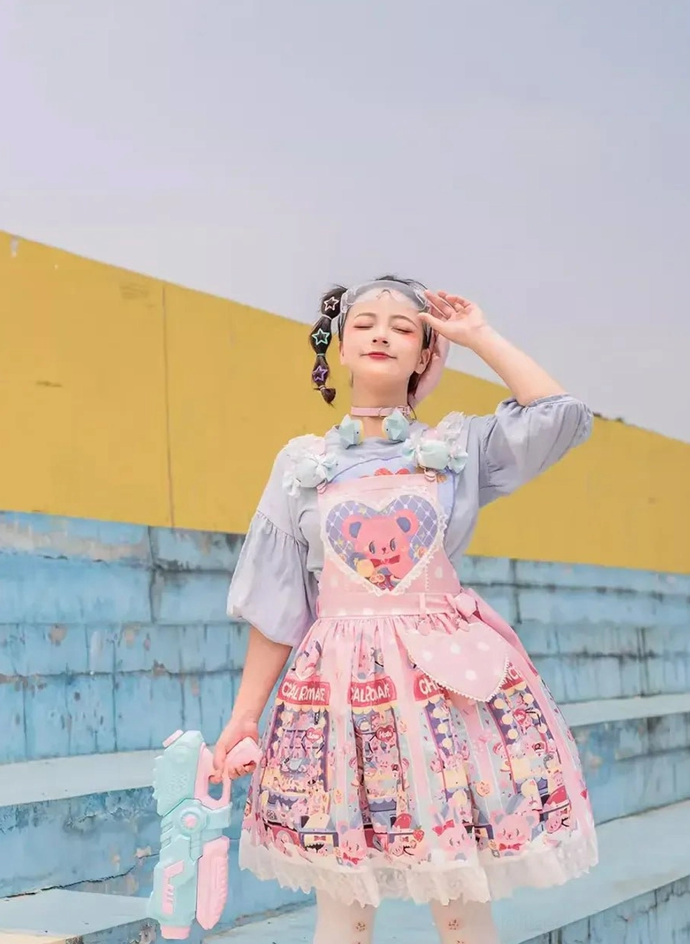 Pink sweet lolita salopette dress with bear print white ruffled apron outdoor stairway scene