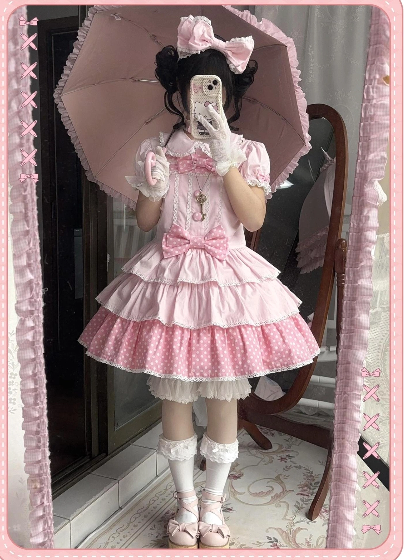 Pink sweet lolita salopette jsk with cross pendant triple tiered polka dot hem side-front mirror selfie