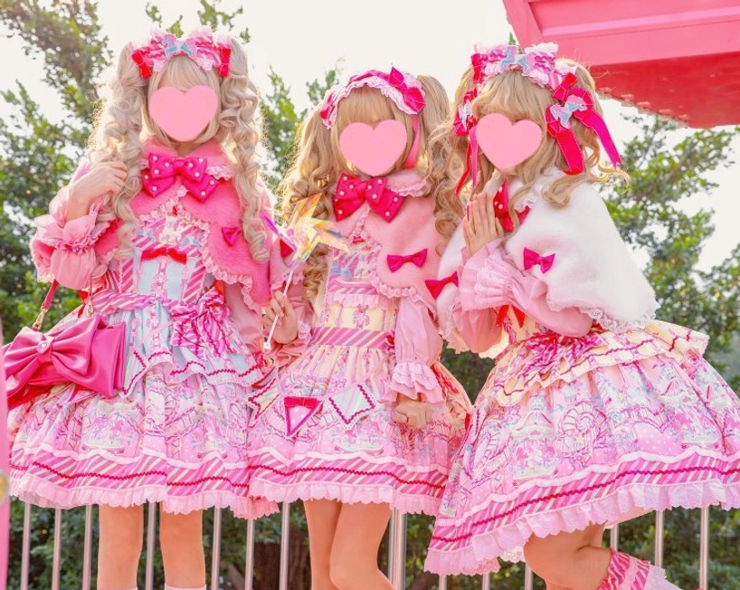 Pink and white Lolita cape layering over dress showing versatile styling option for winter wear