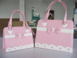 Pink and white lolita tote bag with structured square shape bow detail factory display