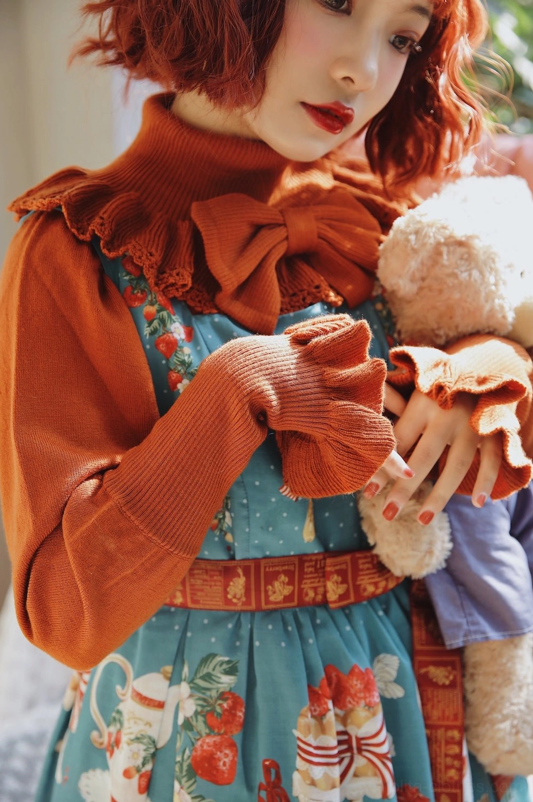 Pink wool lolita sweater side view fitted silhouette sweet lolita coordination layering piece