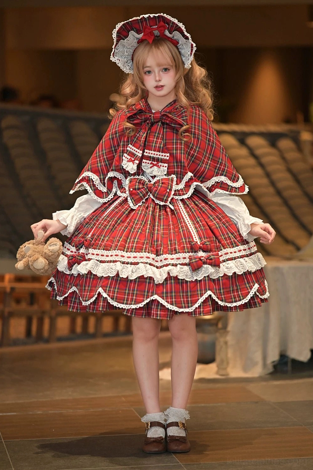 Plaid lolita OP dress showing upper bodice construction, square neckline fit, short sleeve proportion, and refined tailoring details