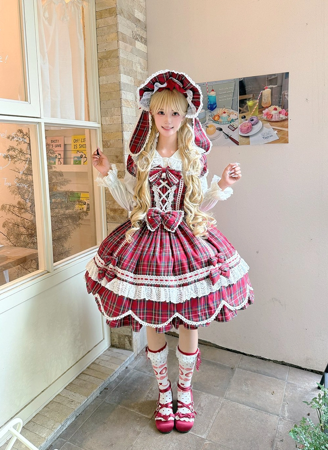 Close-up of plaid lolita dress fabric showing tartan weave pattern, polyester-cotton blend texture, and color saturation of plaid design