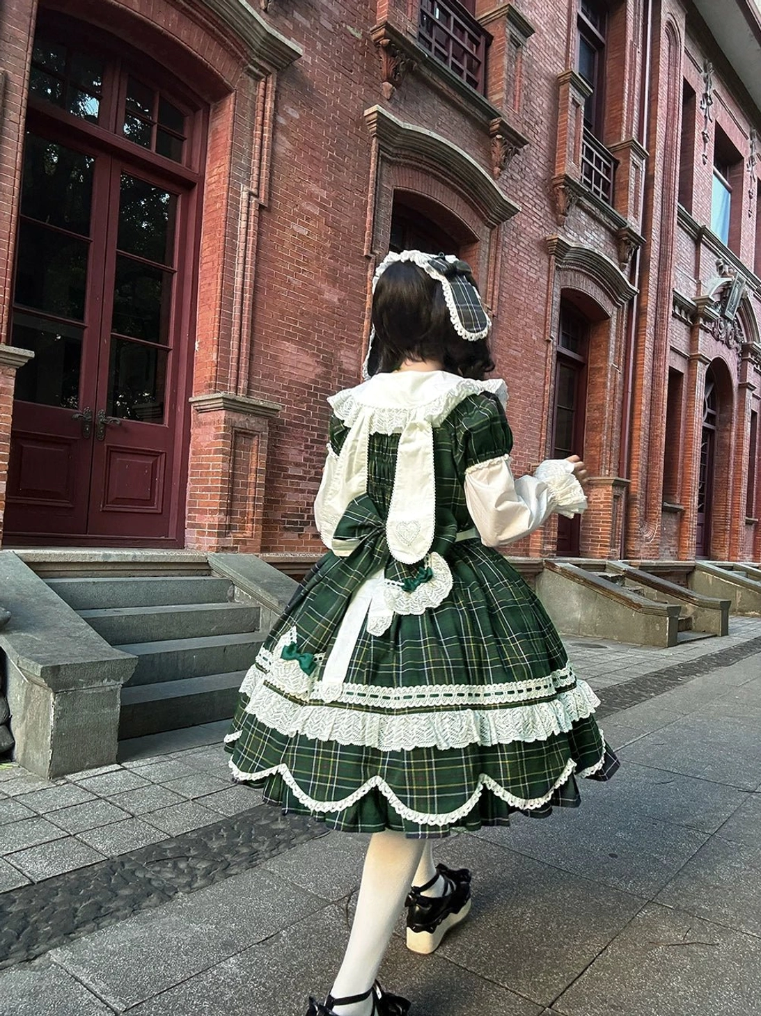 Plaid lolita one-piece dress model wearing at outdoor venue demonstrating versatility for daily outings and special events