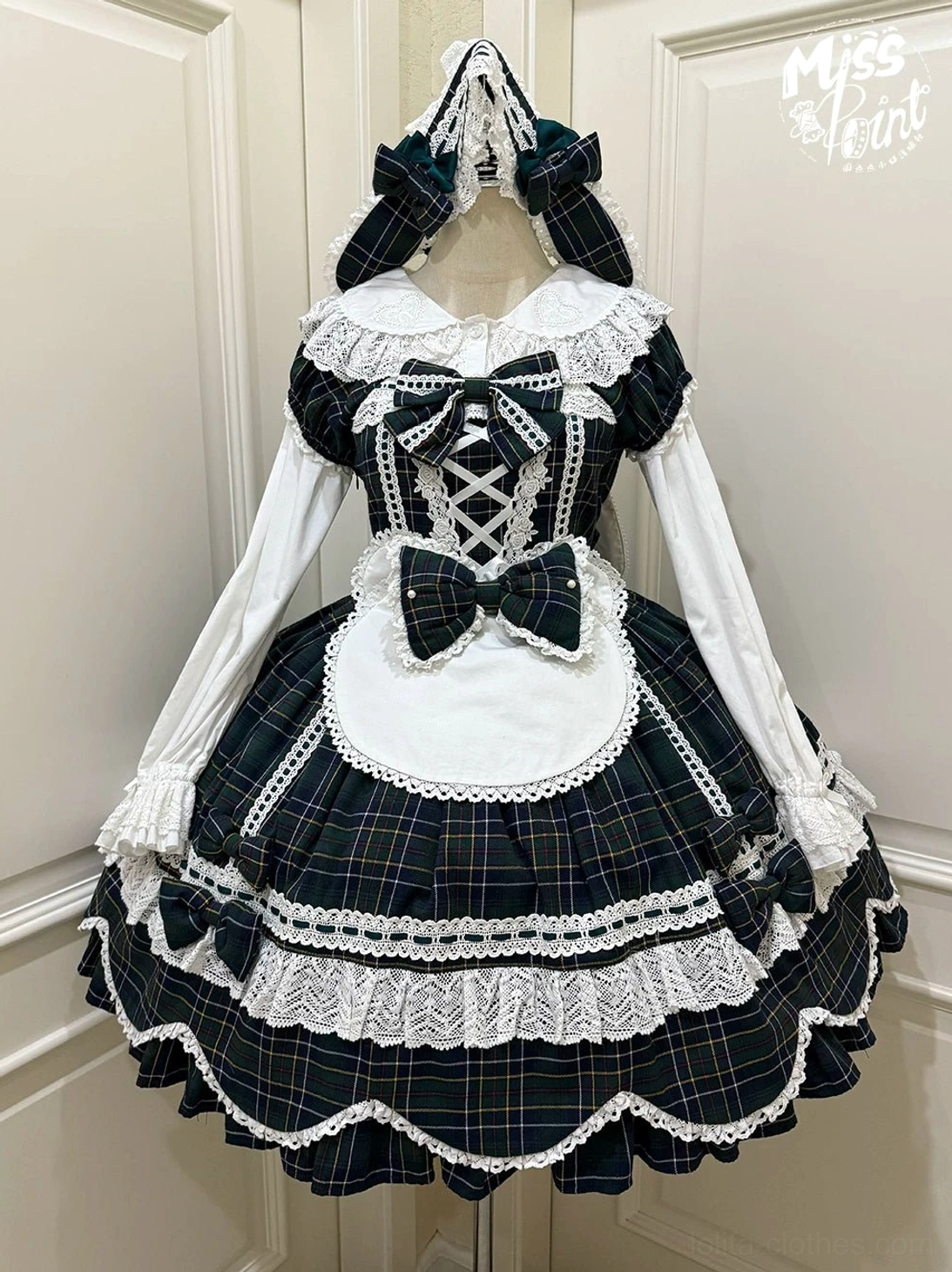 Plaid lolita OP dress neckline and upper shoulder detail showing square neckline construction, lace trim, and refined neckline styling