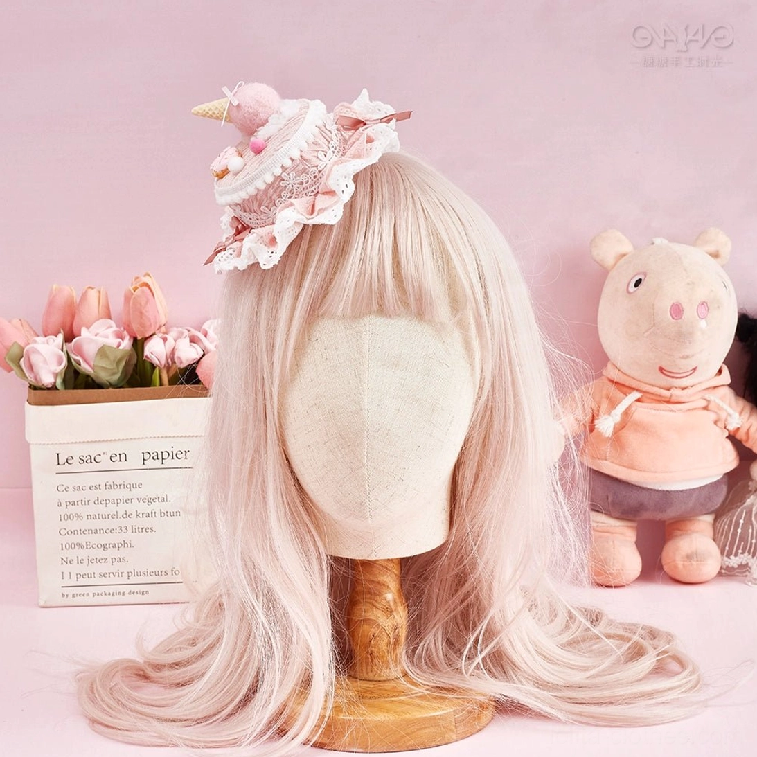 Playful Lolita cake top clip hair accessory featuring miniature donut ice cream and satin bow decorative details